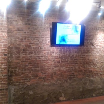 Salsa Salsa Dance Studio - Exposed brick opposite mirrored wall - Performing Arts Near Me - Brooklyn, New York
