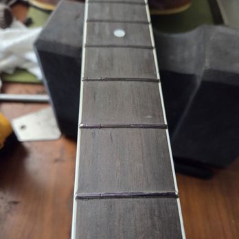 Singing Strings Guitars - D-35 fretboard divits leveled, frets prepped for leveling - Musical Instrument Services Near Me - Porter, Oklahoma