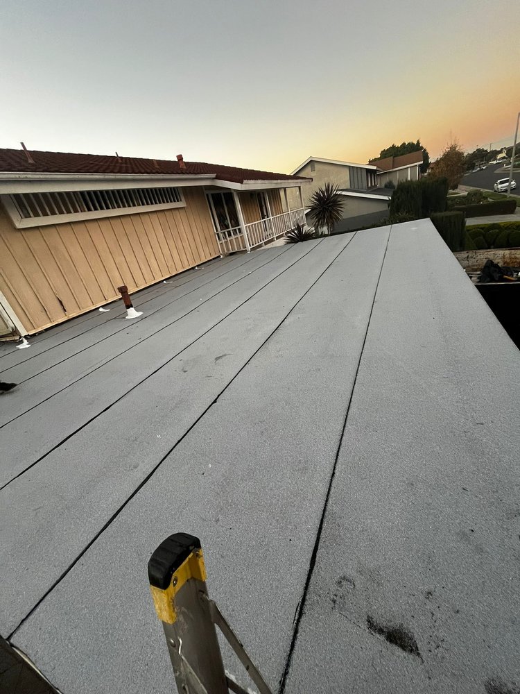 Slide of CV Roofing Services