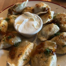 Outstanding spinach, potato and meat pierogis.