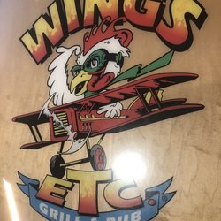 Wings Etc - Table with Logo