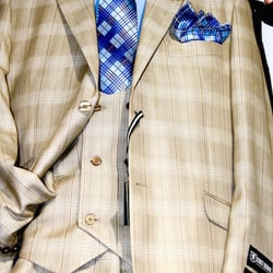 Goodluck Menswear - Tan Plaid Suit coordinated with matching Navy Tie, Lapel Pin and Pocket Square ensemble.