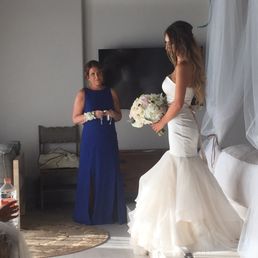 Christine sprayed me, my mom, and all of my girls before my wedding and the color was AMAZING!!!  Nothing rubbed off on my dress.