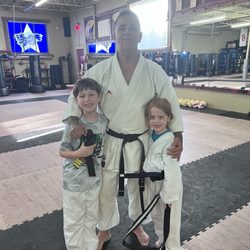East West Okinawan Karate - Miss Lily Leo received her Black belt. Along with her brother Noah and their sensei Dave. 2026.