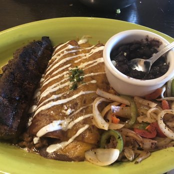 Carlos O'Kelly's - Steak and Enchiladas with black beans and fajita veggies! So good! - Tex-Mex Near Me - Iowa City, Iowa Carlos O'Kelly's - Steak and Enchiladas with black beans and fajita veggies! So good! - Tex-Mex Near Me - Iowa City, Iowa