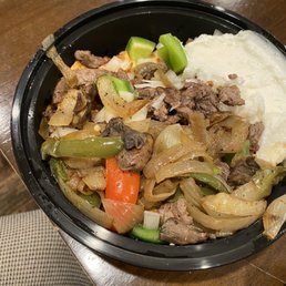 Mixed Sharmwa bowl with garlic sauce. Garlic sauce good. Mixed Sharmwa bowl with garlic sauce. Garlic sauce good.
