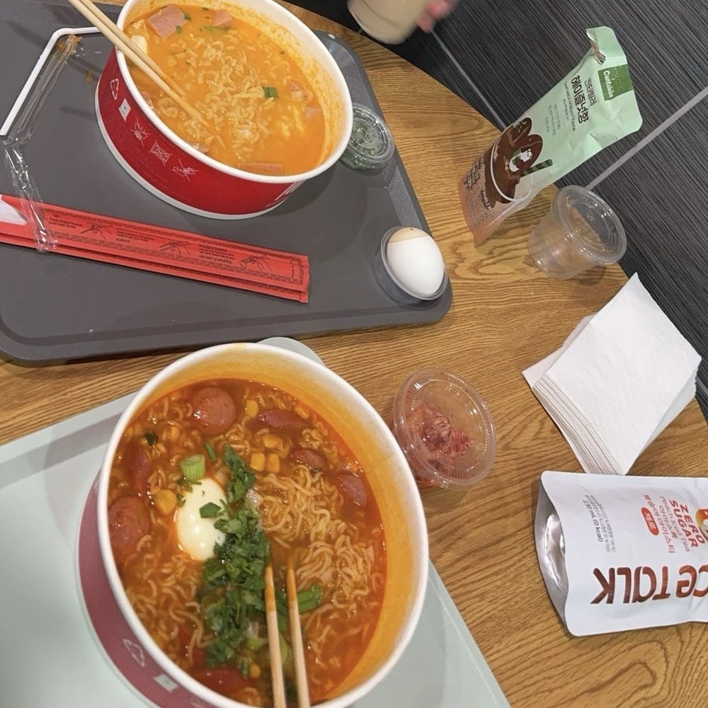 Cheese ramen on the top Spicy Chicken ramen on the bottom Cheese ramen on the top Spicy Chicken ramen on the bottom