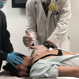 Receiving Prolotherapy in C-spine.