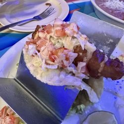 Los Potrillos - One of the three fish tacos in the order.