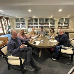 Pop-in Care - Parentis Health - Friendly faces of our local senior community, enjoying their snacks while engaging in fall prevention seminar.