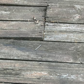 Howard Property Management, Inc - More loosened wood planks AFTER the work was done. - Property Management Near Me - Columbia, Maryland