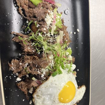 Eat Chingon - Plantain poutine with a fried egg - Comfort Food Near Me - San Antonio, Texas Eat Chingon - Plantain poutine with a fried egg - Comfort Food Near Me - San Antonio, Texas