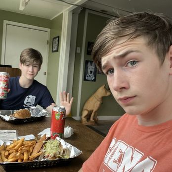 Def Louie’s - Us at a table with our food - Sandwiches Near Me - Steubenville, Ohio