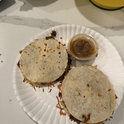 Empire's Taco Truck - Never seen this as small quesadillas, also barely anything inside .