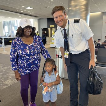 Spirit Airlines - She got a shot with the pilot - Airlines Near Me - Houston, Texas