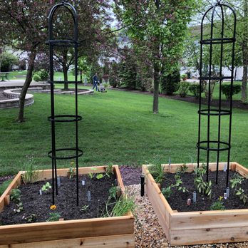 Culinary Gardens - Completed twin cedar raised beds with plants and seeds. It will fill up once the seeds and plants get growing! - Gardeners Near Me - Naperville, Illinois
