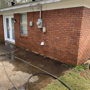 Rushing Lawn Care - a brick house with a water hose attached to it - Pressure Washers Near Me Rushing Lawn Care - a brick house with a water hose attached to it - Pressure Washers Near Me