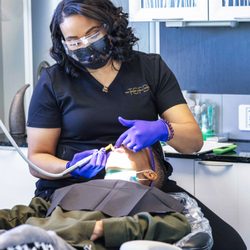 The Grand Family Dental - Pflugerville - Dr. LaResea Woods, fun-lovingly known as Dr. Reesie, has been providing fun and safe dental care to kiddos for over 9 years