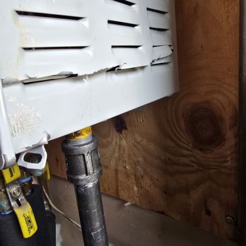 Flash Heating and Cooling - Close up of cut and dented unit - Heating & Air Conditioning/HVAC Near Me Flash Heating and Cooling - Close up of cut and dented unit - Heating & Air Conditioning/HVAC Near Me