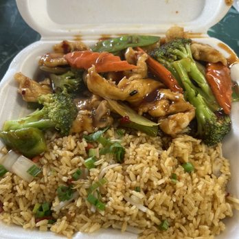 Wok n' Roll - Chicken with garlic sauce, pork fried rice. - Chinese Near Me - Ayer, Massachusetts Wok n' Roll - Chicken with garlic sauce, pork fried rice. - Chinese Near Me - Ayer, Massachusetts