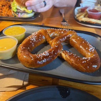 The Southern Growl - Pretzel with cheese dip & mustard - Gastropubs Near Me - Greer, South Carolina The Southern Growl - Pretzel with cheese dip & mustard - Gastropubs Near Me - Greer, South Carolina