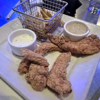 Yard House - Chicken fingers- side of fried. Half off during happy hour. I ate about 3 fingers and some fries before i took the pic. I was hungry haha - Bars Near Me - Norwalk, Connecticut Yard House - Chicken fingers- side of fried. Half off during happy hour. I ate about 3 fingers and some fries before i took the pic. I was hungry haha - Bars Near Me - Norwalk, Connecticut