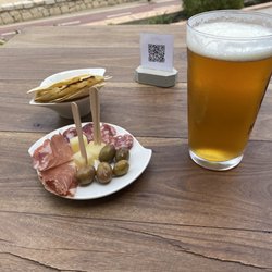 Cutter Bistro - Beer and small platter of ham, salami, cheese and olives.