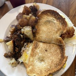 Talk of the Town - Breakfast sandwich with potatoes