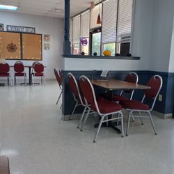 Slice of Heaven Pizza & Wings - Industrial seating.