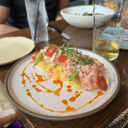 Raphaël Peruvian Cuisine - Causa Acevichada (Steelhead Trout Ceviche, Avocado, Aji Amarillo Potato Terrine, Tomato, Salsa Golf, Aji Panca-infused Oil)