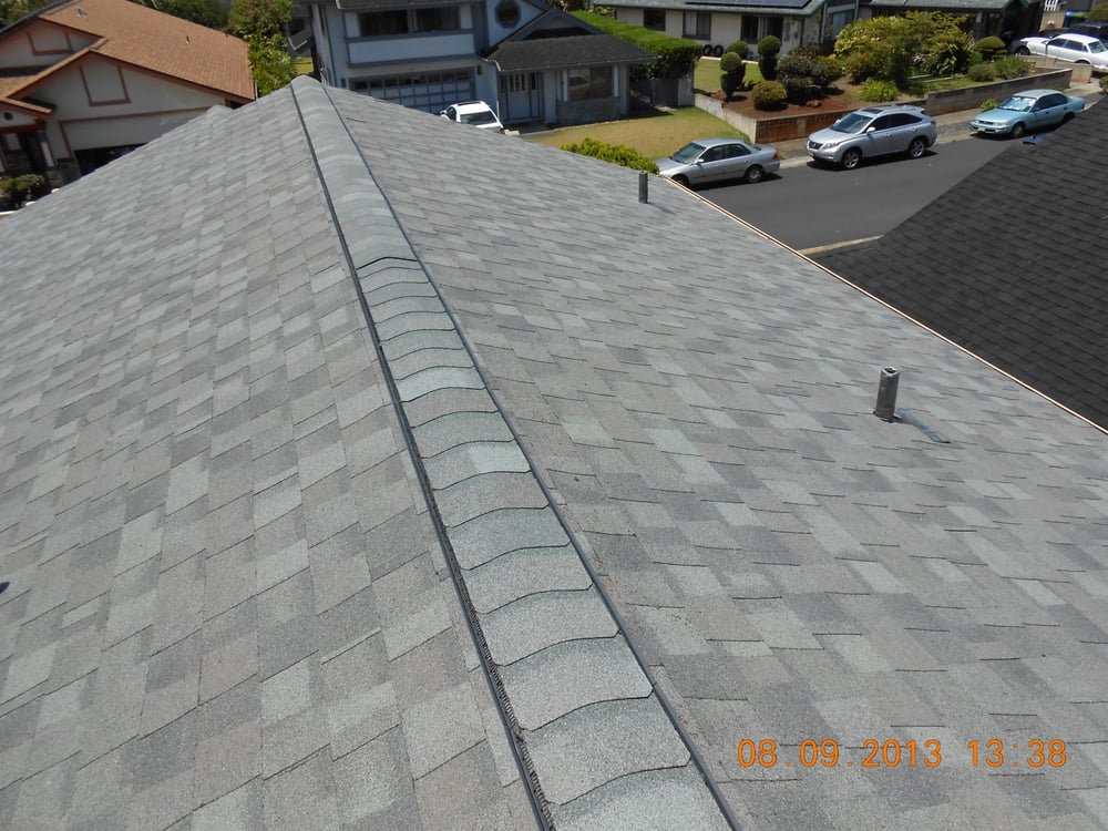 Slide of R.S. Toyama Roofing Service