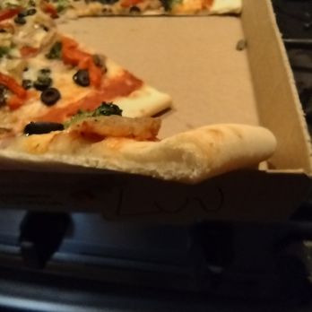 Flippin' Pizza -  slice taken out of a pizza box - Pizza Near Me - Bethesda, Maryland
