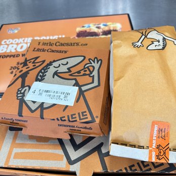 Little Caesars Pizza - a box of little caesars on a table - Pizza Near Me - Mississauga, Ontario Little Caesars Pizza - a box of little caesars on a table - Pizza Near Me - Mississauga, Ontario