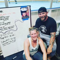 The Garage Gym at Rock Sports Arena - Member honoring another members fallin' Marines with a WOD.