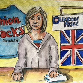 Union Jack's Pub - A watercolor artwork shows a woman with shoulder-length hair sitting at a table, with her hands resting on a cloth. Behind her are decorations including a blue T-shirt with 'Union Docks Glenside, PA' and a banner with 'London Pride' and a Union Jack flag. The background is yellow, and the scene appears to celebrate British culture or a themed event. The artwork is signed and dated April 2024. - Pubs Near Me - Glenside, Pennsylvania