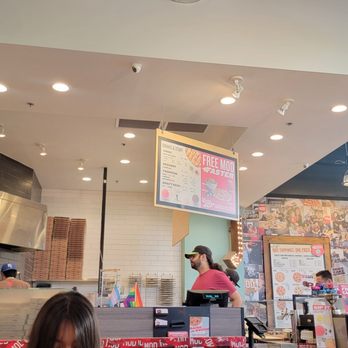 MOD Pizza - a woman ordering food in a restaurant - Pizza Near Me - Tempe, Arizona MOD Pizza - a woman ordering food in a restaurant - Pizza Near Me - Tempe, Arizona