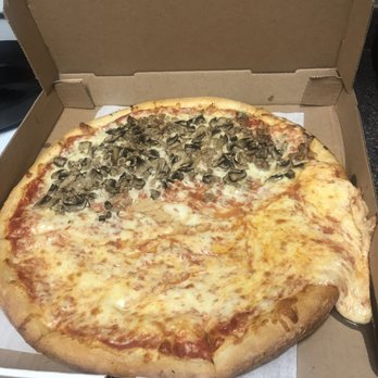 Yordana's Pizza & Pasta - Traditional Pizza with extra cheese on the right . - Pizza Near Me - Wrightstown, New Jersey Yordana's Pizza & Pasta - Traditional Pizza with extra cheese on the right . - Pizza Near Me - Wrightstown, New Jersey