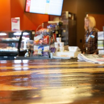 Koelbel Library Cafe - a woman at the counter - Cafes Near Me - Centennial, Colorado Koelbel Library Cafe - a woman at the counter - Cafes Near Me - Centennial, Colorado