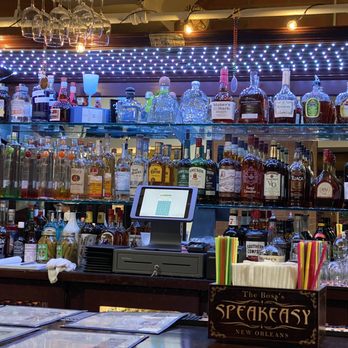 Dat Creole Soul - a bar filled with liquor - Food Trucks Near Me - Des Moines, Washington