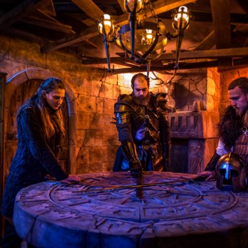 Escape Dimension - Arriverez vous à découvrir tous les mystères de la table ronde ? (photo prise dans nos décors) - Escape Games Near Me - Saleilles, 66 Escape Dimension - Arriverez vous à découvrir tous les mystères de la table ronde ? (photo prise dans nos décors) - Escape Games Near Me - Saleilles, 66