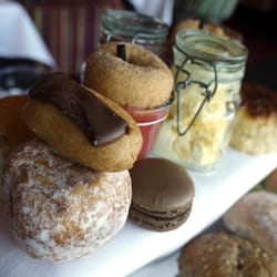 Marco's New York Italian MediaCityUK - Desserts: doughnut, eclair, macaron, scones, mini doughnut on top of a mousse.