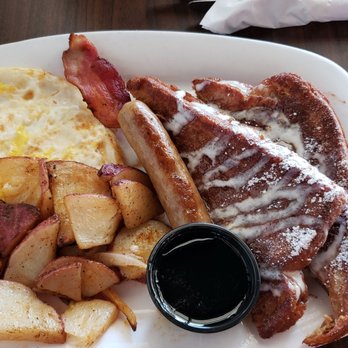 Toasted - Pumpkin Cream Cheese Stuffed French Toast with eggs and sausage and country potatoes - Breakfast & Brunch Near Me - Bakersfield, California Toasted - Pumpkin Cream Cheese Stuffed French Toast with eggs and sausage and country potatoes - Breakfast & Brunch Near Me - Bakersfield, California