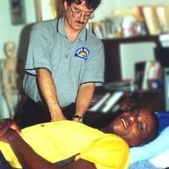 Massage Therapy Houston - John working on Olympic Champion Carl Lewis - Massage Therapy Near Me - Houston, Texas Massage Therapy Houston - John working on Olympic Champion Carl Lewis - Massage Therapy Near Me - Houston, Texas