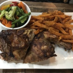 Half a chicken with sweet potatoes fries.... It was good! Half a chicken with sweet potatoes fries.... It was good!