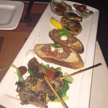 Wine 30 - Appetizer sampler with lamb skewers, steak tartare, grilled shrimp, and raw oysters - Wine Bars Near Me - New York, New York Wine 30 - Appetizer sampler with lamb skewers, steak tartare, grilled shrimp, and raw oysters - Wine Bars Near Me - New York, New York