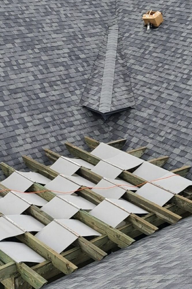 Slide of Hallco Roofing