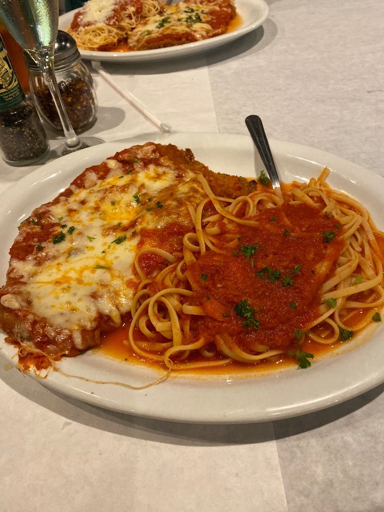 Carini's Pizzeria & Trattoria Logo