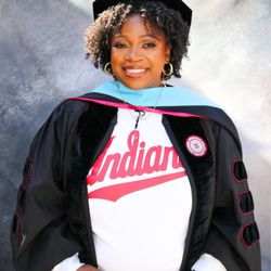 Doctoral cap and gown photo