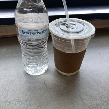 The BrickHaus - "24oz" matcha latte next to a 16.9 oz water bottle for size reference. - Cafes Near Me - Ridley Park, Pennsylvania
