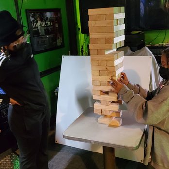 Cosmic Burrito Tequila Bar, Food Truck and catering - Bar games!!! Giant Jenga is in front of the 25 cent per person dart machines - Bars Near Me - Charter Twp, Michigan Cosmic Burrito Tequila Bar, Food Truck and catering - Bar games!!! Giant Jenga is in front of the 25 cent per person dart machines - Bars Near Me - Charter Twp, Michigan